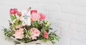 Colorful Mother's Day bouquet featuring pink roses and tulips